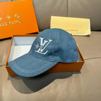 Blue denim baseball cap with front LV logo embroidery and curved brim.