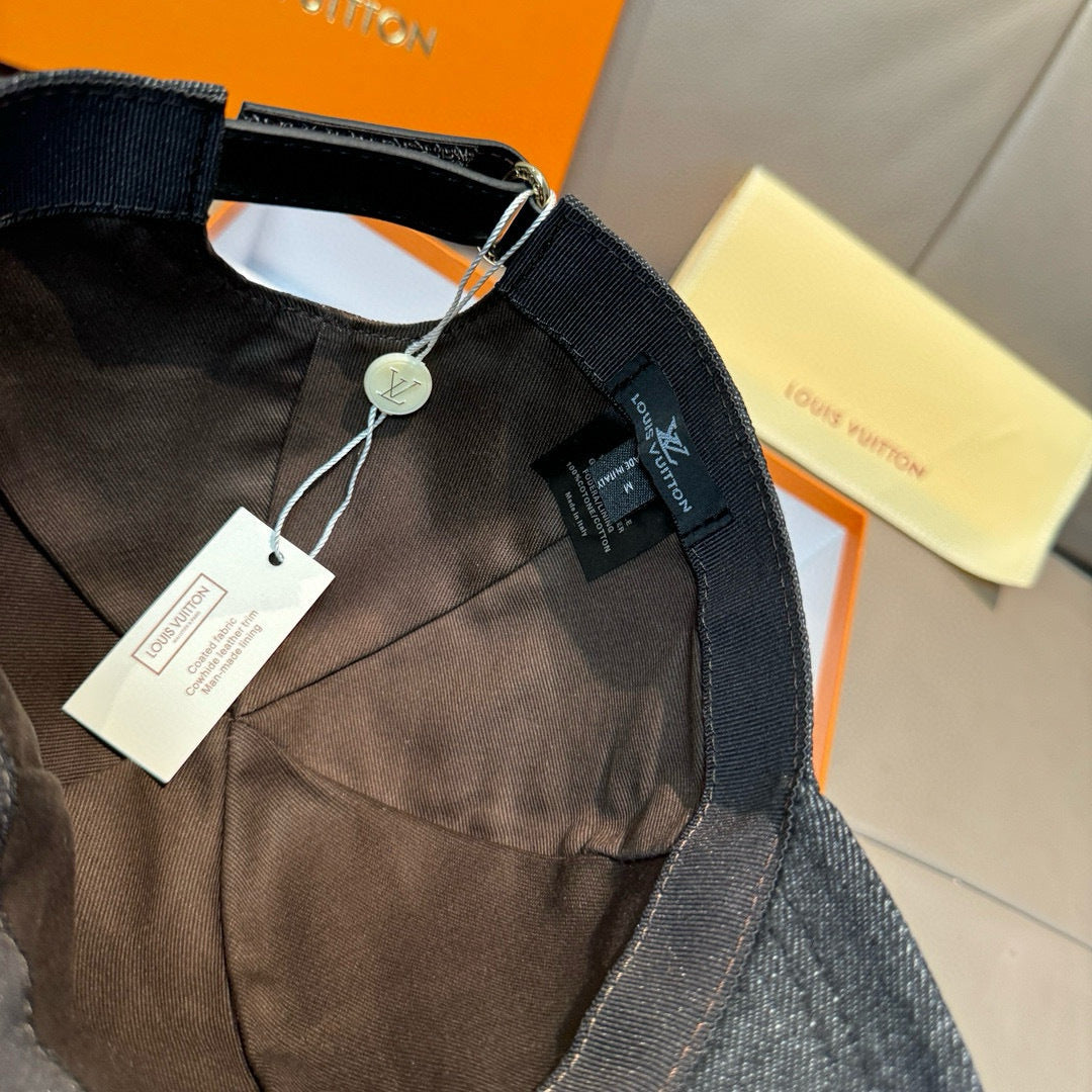 Louis Vuitton cap lining and strap, black denim with hanging tags