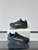 Black lace-up chunky sneakers with side check panel and rugged tread sole
