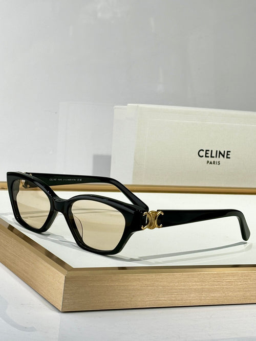 Black square eyeglasses with tan lenses and gold C clasp at the bridge