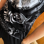 Versace graphic T-shirt, black with silver swirl pattern and small figure details