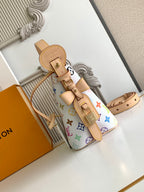Louis Vuitton multicolor monogram mini handbag with tan crossbody strap and buckle