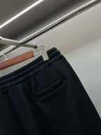Burberry dark navy track shorts with front zip pocket and stitched seams