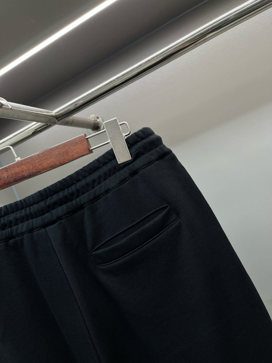 Burberry dark navy track shorts with front zip pocket and stitched seams