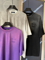 Short-sleeve T-shirts: cream, dark gray, and purple, each with embroidered chest details.