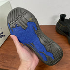 Burberry sneakers outsole view, grey tread with blue printed patterns