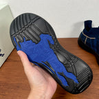 Burberry sneaker outsole with patterned tread in black and blue