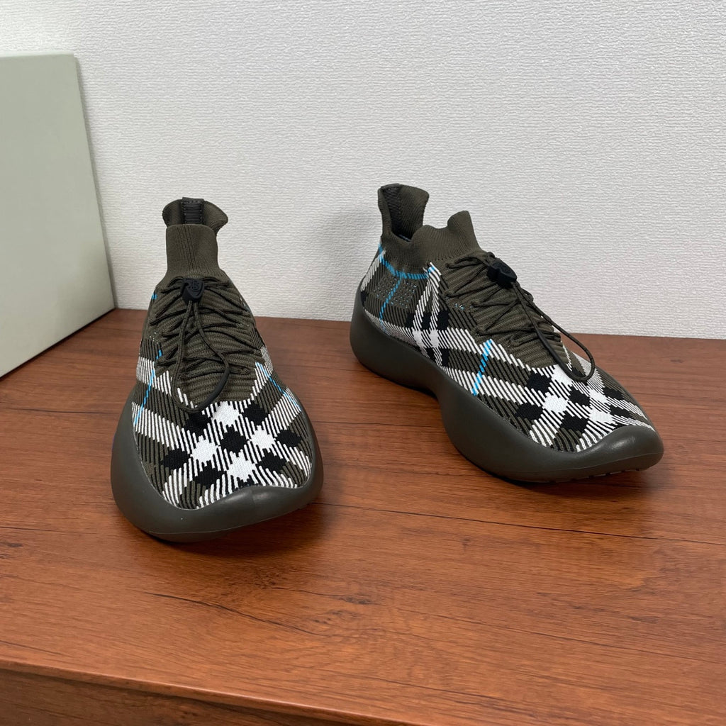 Burberry knit sneakers, black-and-white plaid upper with blue trim and lace-up front