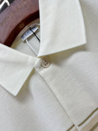 Burberry polo shirt collar with button closure and subtle textured knit fabric