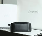 Black YSL bag with top zip closure and smooth rectangular front