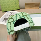 Green patterned baseball cap with white adjustable strap panel