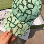 Green patterned baseball cap detail on brim and crown