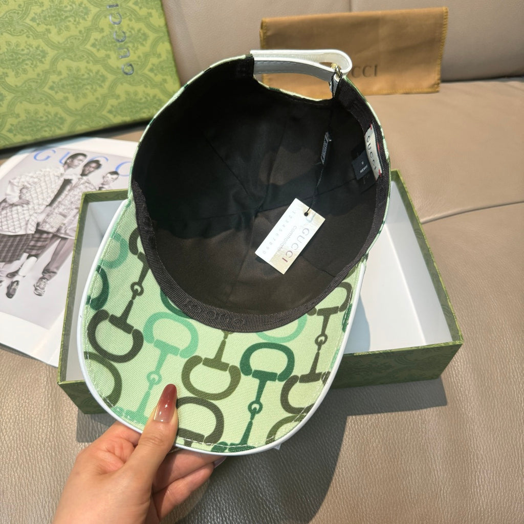 Baseball cap interior with black lining and green patterned brim