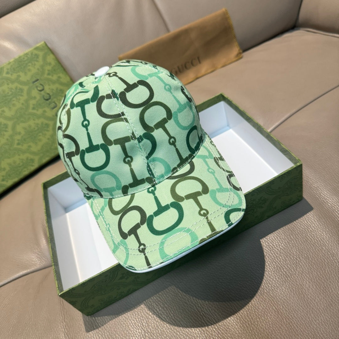 Green Gucci monogram logo cap with curved brim