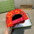 Gucci cap with red underside strap and black interior, curved brim