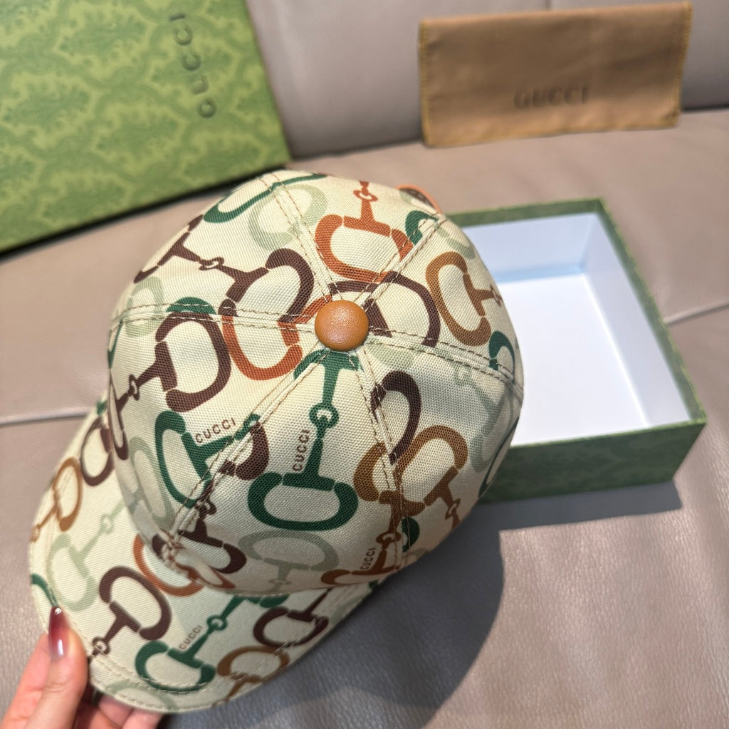 Gucci cap, beige horsebit print; side view with tan stitched edge