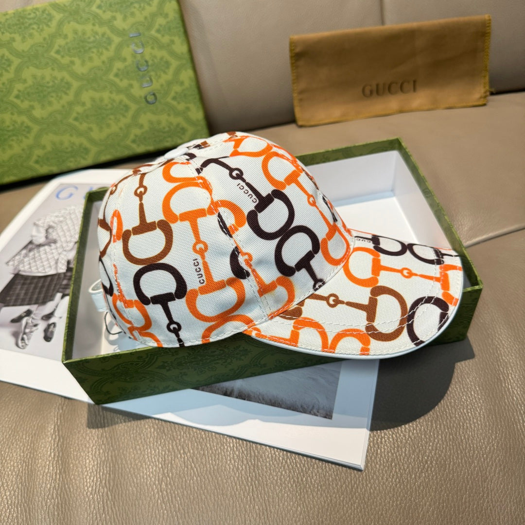 Gucci cap in white with orange and black interlocking link logo print, curved brim.