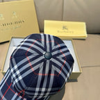 Navy plaid baseball cap with round button top and red grid pattern