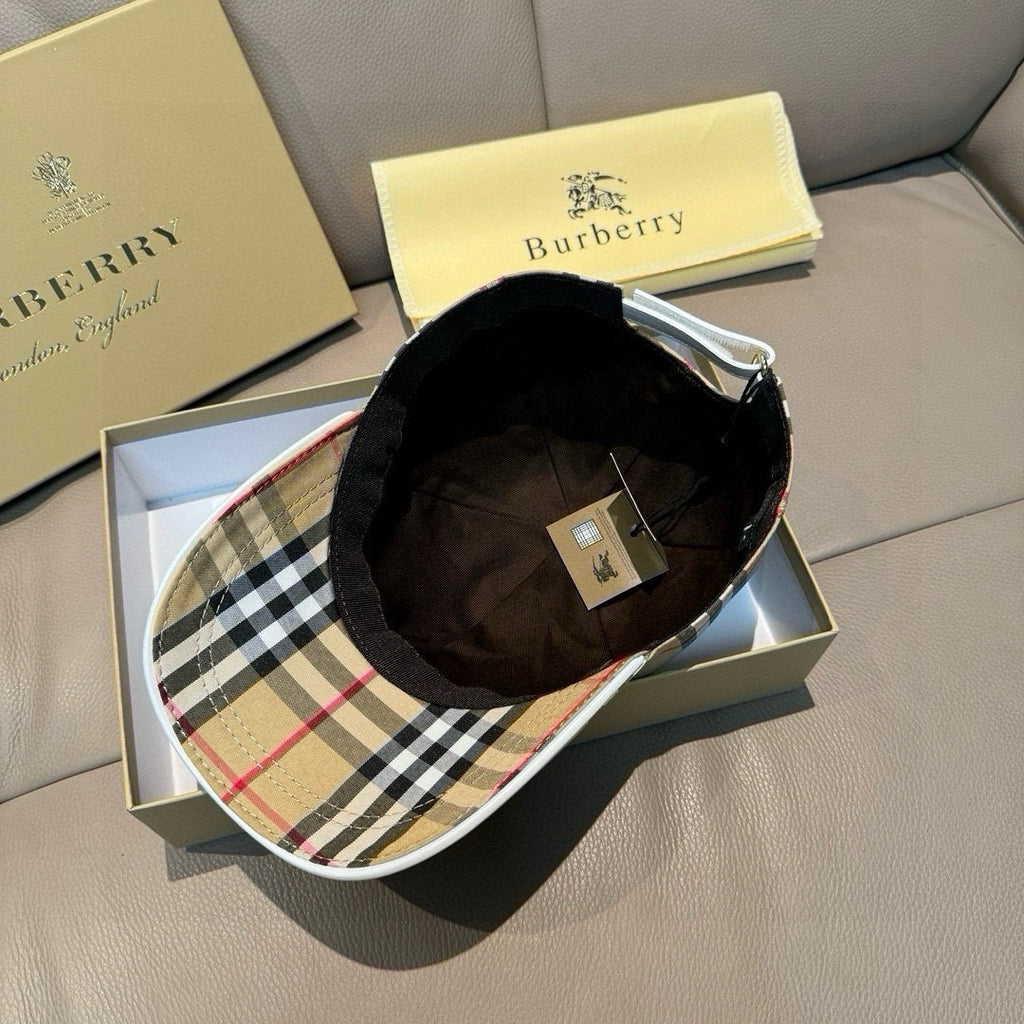 Plaid baseball cap with black interior lining and inner size label tag.