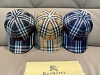 Set of three plaid baseball caps: black/red, beige/red, and navy/white