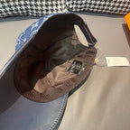 Baseball cap interior view with dark lining and brim edge stitching