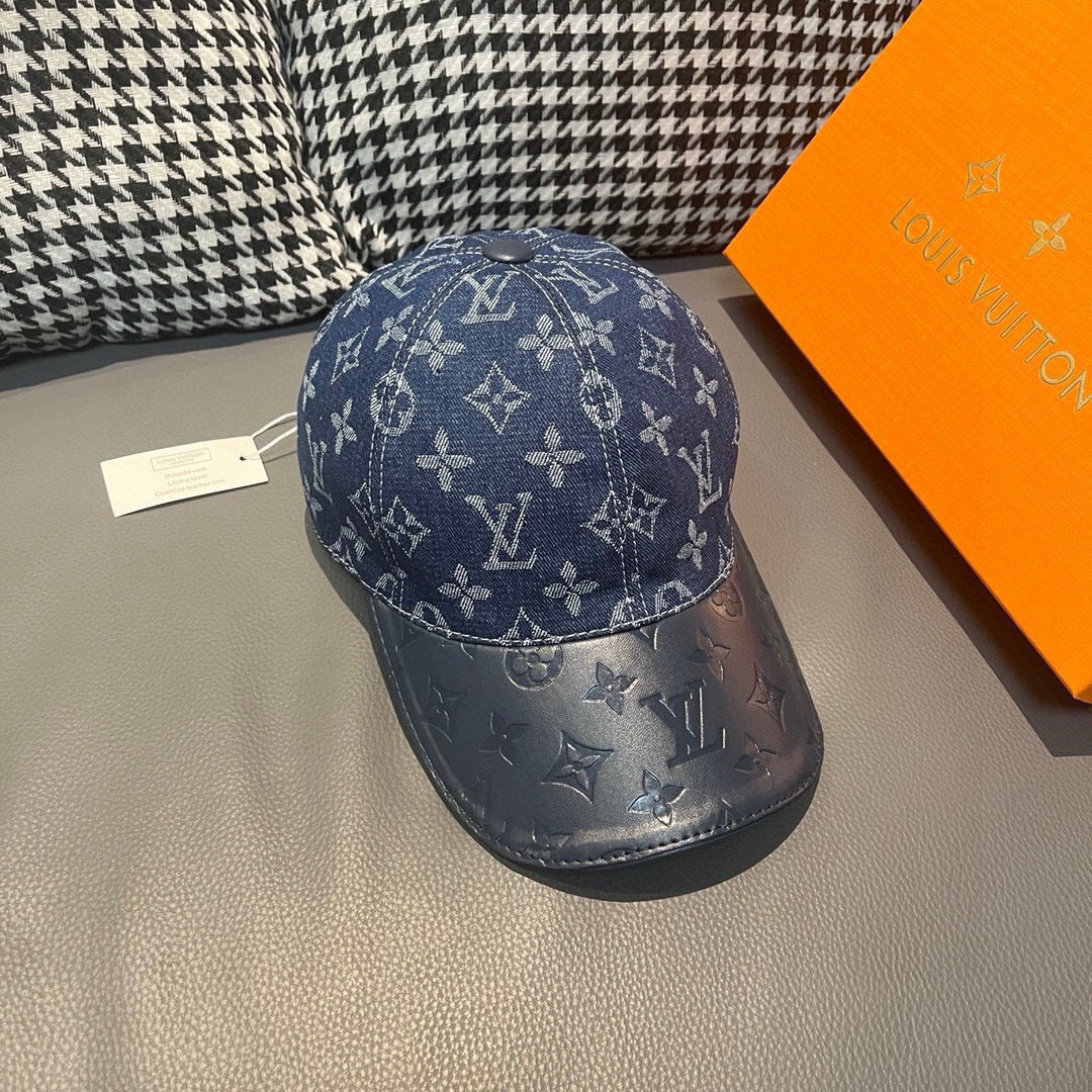 Baseball cap, dark blue with repeating monogram motifs and curved brim
