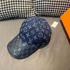 Louis Vuitton cap in blue denim with monogram pattern and checkered front panel