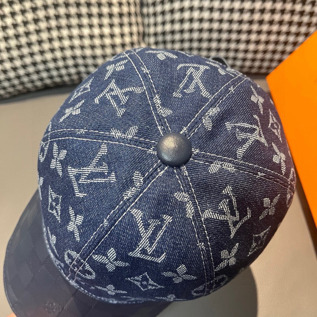 Louis Vuitton cap top view in blue denim with monogram print and round button