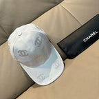 Chanel cap light white with allover CC logo pattern and curved brim, round button on crown
