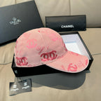 Pink baseball cap with curved brim and allover CC logo print
