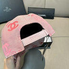 Pink baseball cap with adjustable strap and inside label