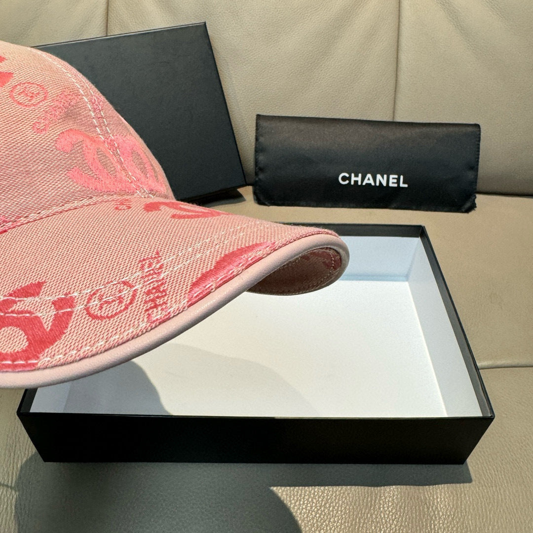 Pink baseball cap side view with curved brim and stitched panel seams