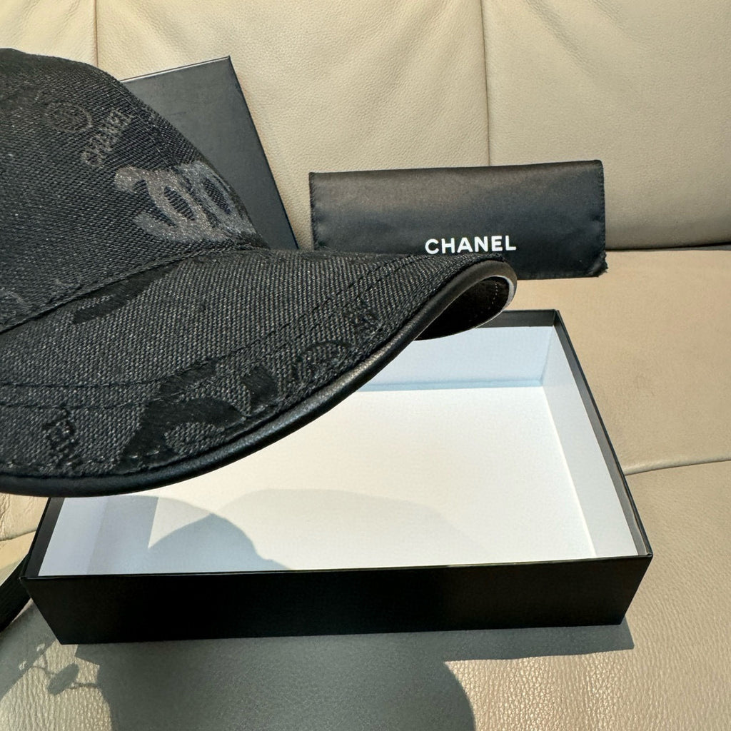 Black monogram baseball cap side view with curved brim