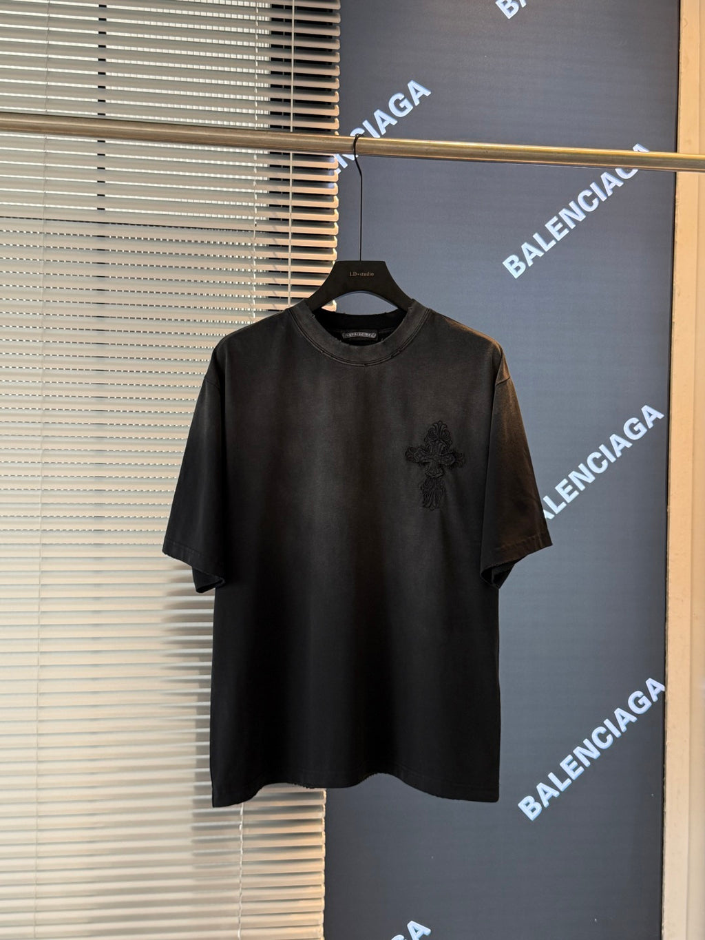 Black short-sleeve T-shirt with small chest dragon graphic