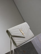 YSL white quilted shoulder bag with front flap and gold YSL monogram clasp