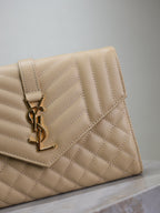 YSL quilted beige flap bag with gold YSL logo detail
