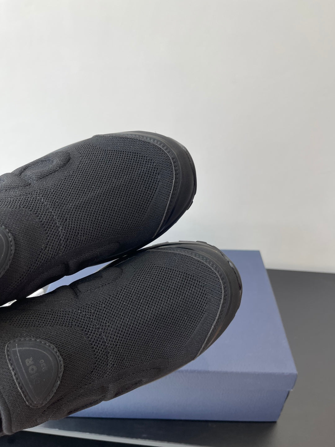 Dior slip-on sneaker toe and knit texture, dark gray, cushioned sole