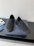 Dior slip-on sneakers, dark gray, rounded toe, padded collar, side logo
