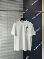 White short-sleeve T-shirt on hanger with chest botanical bird embroidery