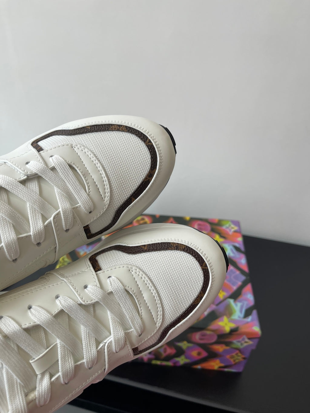 Louis Vuitton ladies sneakers, white upper with dark edging and textured rubber outsole
