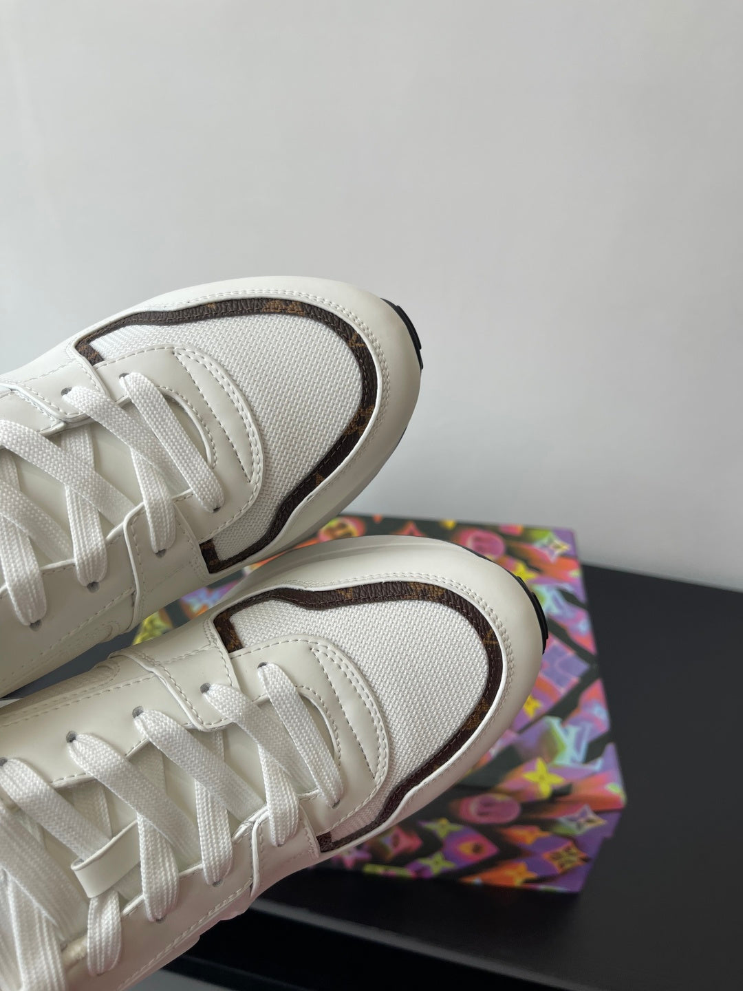 Louis Vuitton ladies sneakers, white upper with dark edging and textured rubber outsole