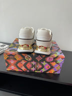 Louis Vuitton ladies sneakers, white with padded heel and gold accent on heel tab