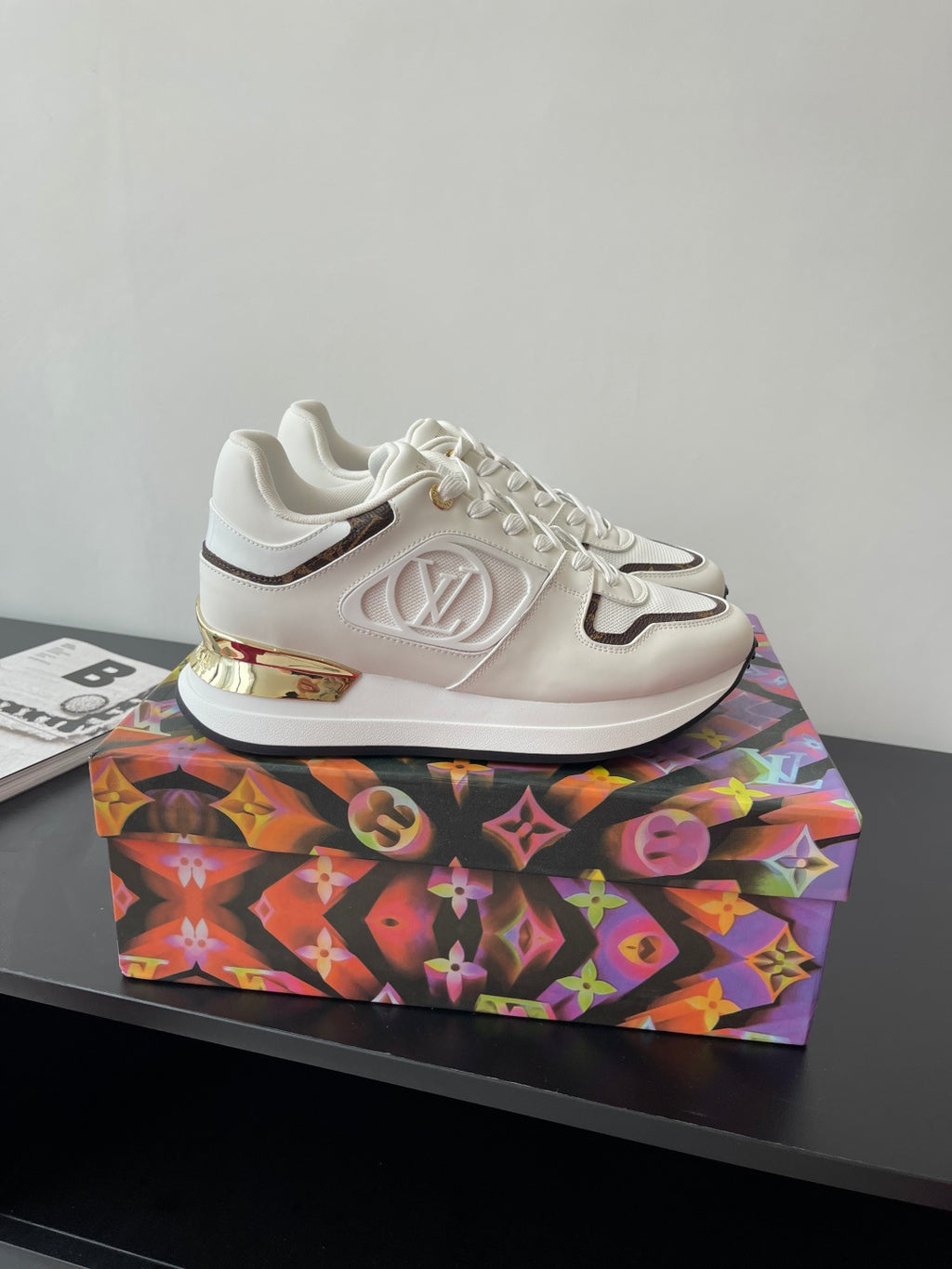 Louis Vuitton ladies sneakers, white with gold accent midsole and LV-style emblem