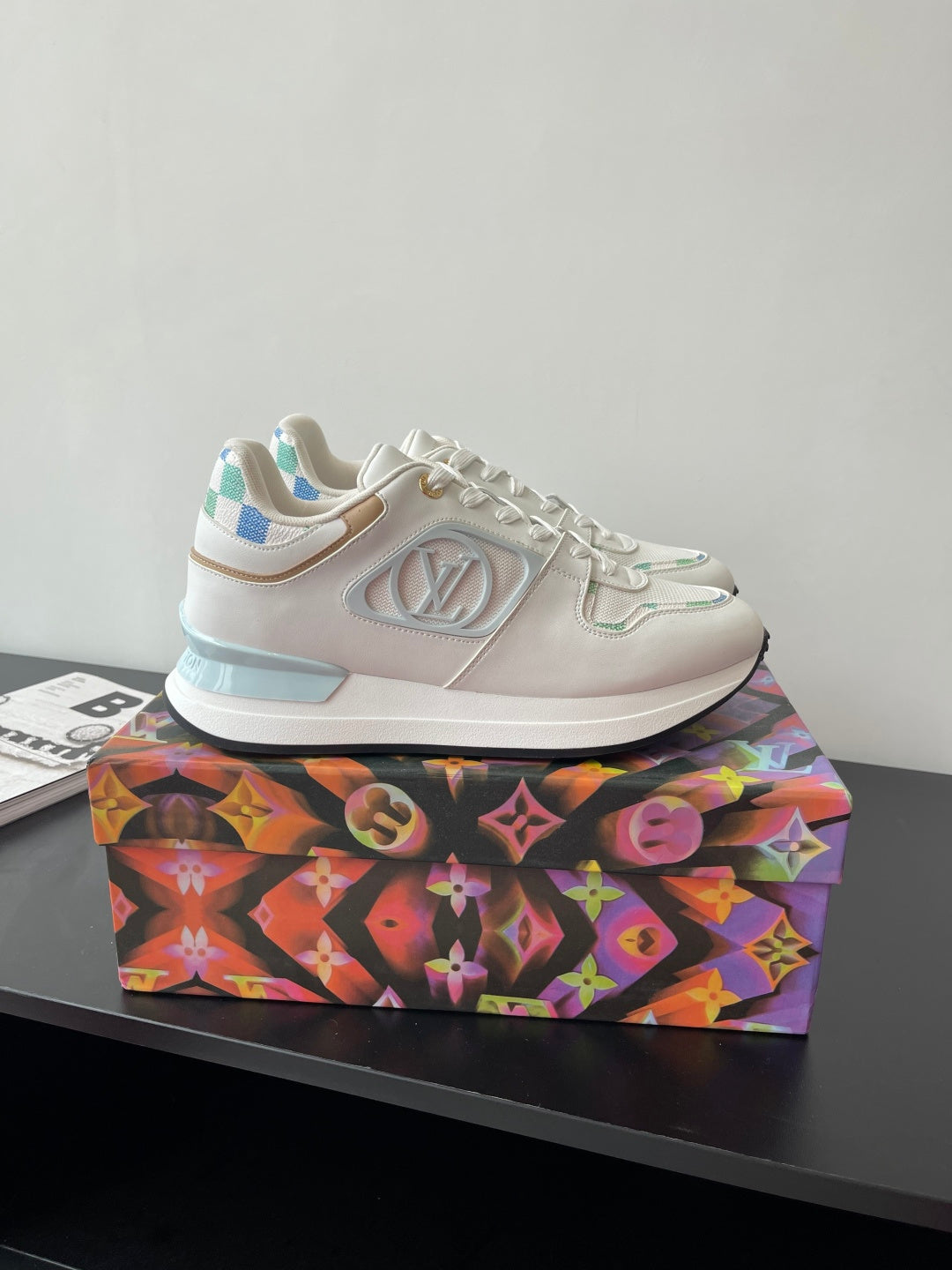 Louis Vuitton women's sneakers in white with light blue trim and chunky sole