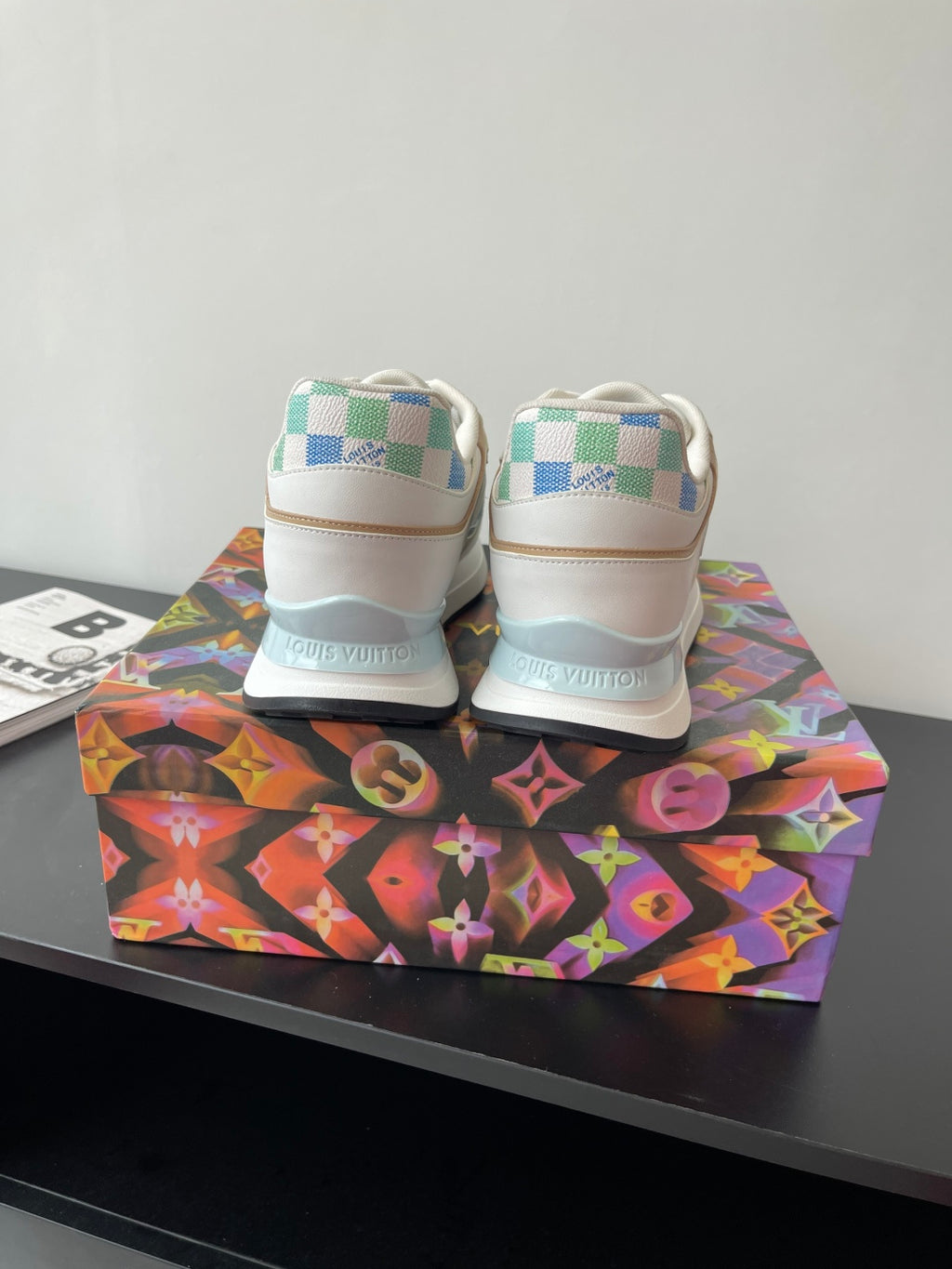 Louis Vuitton women's sneakers, white back view with blue check trim at heel