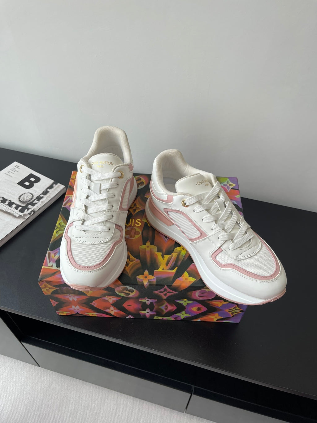 Women's Louis Vuitton sneakers, white with pink logo detail and lace-up front