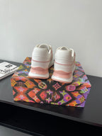 Women's Louis Vuitton sneakers heel view, white uppers with pink stripe detailing