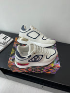 White and navy Louis Vuitton lace-up sneakers with multicolor heel accent