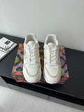 Louis Vuitton ladies white sneakers, lace-up with low-profile rubber sole