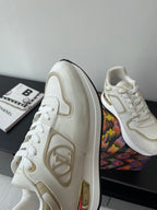Louis Vuitton white low-top sneakers with side logo and lace-up front